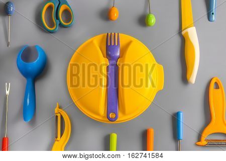 Flat lay set of colour plastic ware