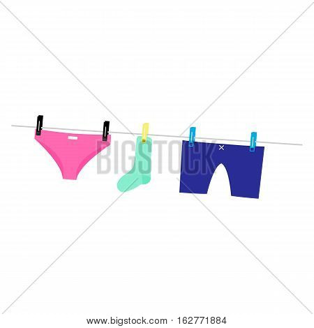 Male and female underweare and sock on rope