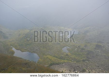 Beautiful Mountain Lake Surrounded By Impressive Mountains Of The Khamar-daban.