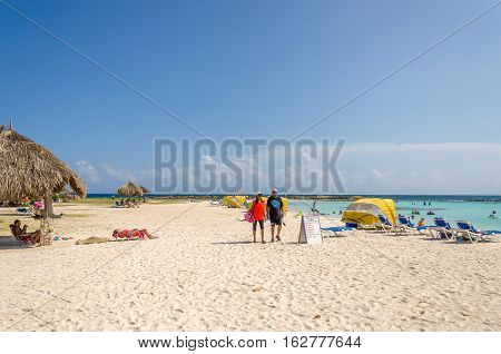 View Of Tourists Enjoying  Baby Beach On Aruba