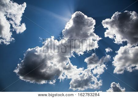rain gray cloud in the bright sun