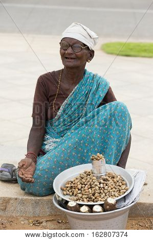 Illustrative image. Pondicherry Tamil Nadu India - July 03 2014. Poor woman worker in small village very hard work for little money roupies