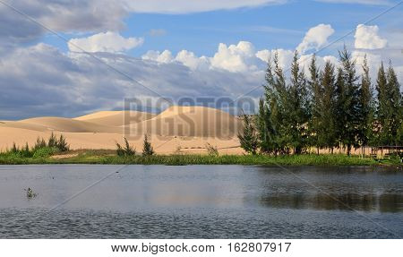 Beautiful landscape with lake and white dunes near Mui Ne place Vietnam