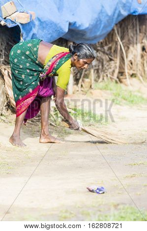 Illustrative image. Pondicherry Tamil Nadu India - July 03 2014. Poor woman worker in small village very hard work for little money roupies