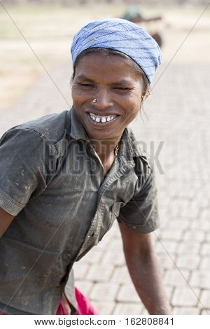 Illustrative image. Pondicherry Tamil Nadu India - July 03 2014. Poor woman worker in small village very hard work for little money roupies