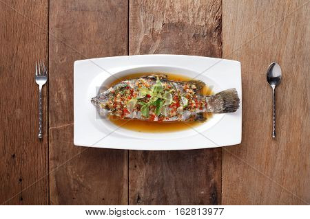 White Pomfret Steamed Dish with lemonReady to eat. On The Table