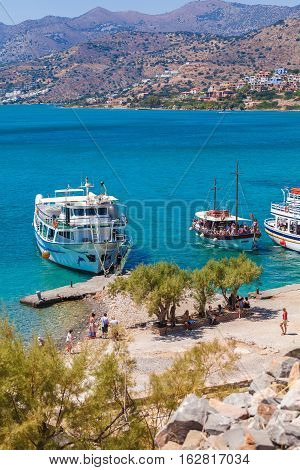 Spinalonga, Crete - July 31, 2012:  The Excursion Boat Took A Group Of Tourists To Visit  Spinalonga