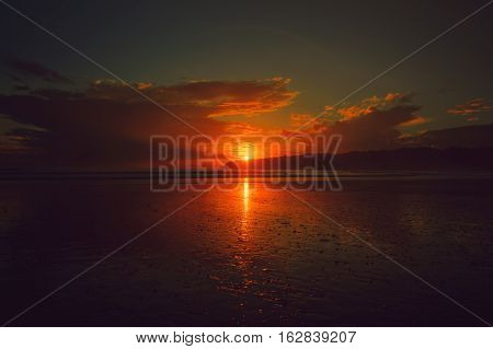 Beautiful sunset on the beach. Time Golden