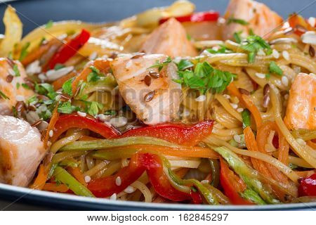 Close Up Of Salmon Pasta And Veggetables