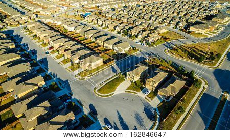 Sunset Suburban Homes North of Austin near Round Rock , Texas as Texas expands more and more homes are built in Modern Neighborhood Communities with Cul De Sac , dead end.