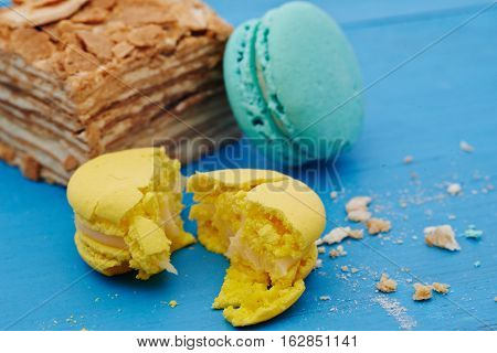 French macaron cookies on a blue wooden table