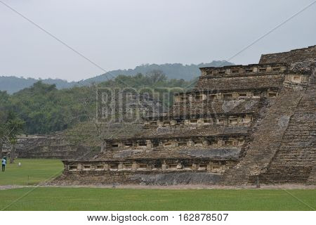 Ruins and pyramids during a thunderstorm at the pre-Columbian archeological site El Tajin in Papantla, Veracruz, Mexico