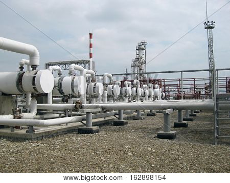 Heat exchangers in a refinery. The equipment for oil refining.