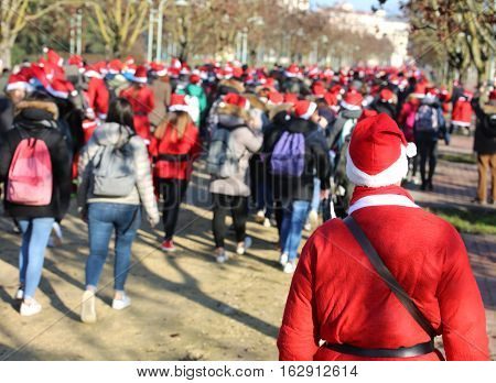 People Dressed As Santa Claus During The Event