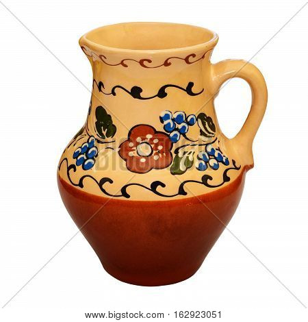 Traditional colored pottery. Painted ceramic jugful. Isolated, white background.