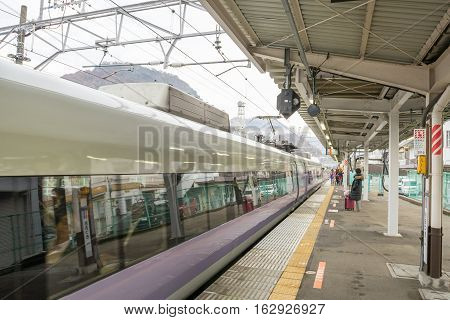 TOKYO, JAPAN - 20 NOV 2016 : Train stopped at Fujikyu Railway station.The railway system is one of the most important public transportation in Japan.