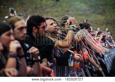 TOLMIN, SLOVENIA - JULY 25TH: HEAVY METAL FANS HEADBANGING AT THE METALDAYS FESTIVAL ON JULY 25TH, 2016 IN TOLMIN, SLOVENIA