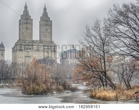 Central Park New York City on foggy morning fter snow storm