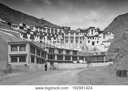 Rizong monastery with view of Himalayan mountians - it is a famous Buddhist temple inLeh Ladakh Jammu and Kashmir India. Black and white image.
