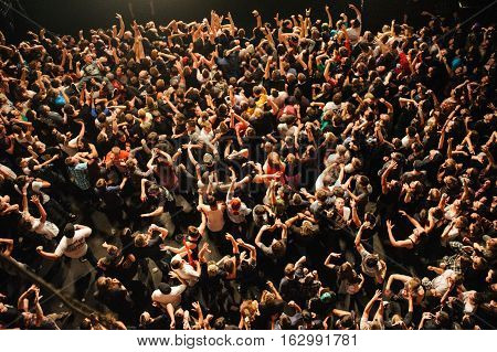 BUDAPEST, HUNGARY - NOVEMBER 29TH: A BIRDS-EYE VIEW OF A CROWD ON A CONCERT DURING PERFORMANCE OF PARKWAY DRIVE BAND AT PECSA MUSIC HALL 2012, IN BUDAPEST, HUNGARY