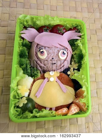 The girl is made of rice. Creative food for good mood and appetite. Kyaraben, bento, chib