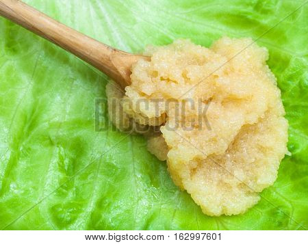 Caviar Of Capelin In Wood Spoon On Green Lettuce