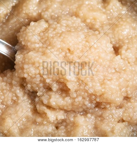 Surface Of Salty Caviar Of Herring Fish With Spoon