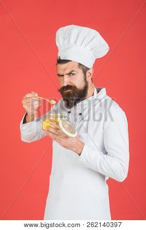 Healthy Food, Cereals, Grits, Organic Food, Restaurant Concept. Professional Male Cook Holds Glass J