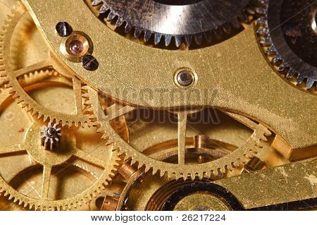 Closeup of the interlocking gears of a pocket watch