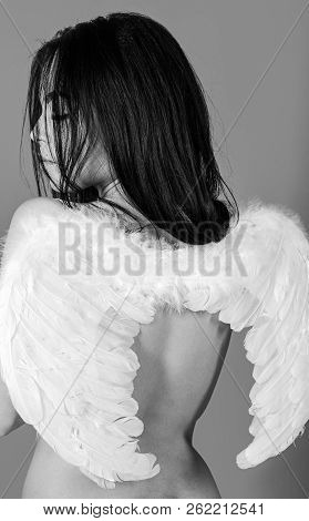 Lady Sexi Dressed As Angel, Red Background, Rear View. Sexy Angel Concept. Girl Naked, Tender And Pu