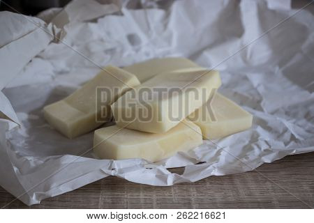 Pieces Of Cheese Eidam Isolated On White Background