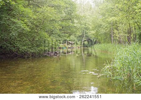 Beautiful River In A Forest. Summerhouse Near The River Bank. Lithuania, Ignalina, Meironys, Meira R