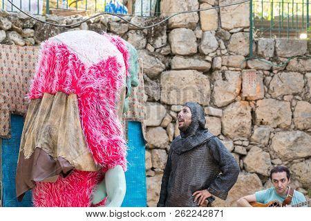 Jerusalem, Israel, September 29, 2018 : Artists In Doll Costumes Play On Scene For Visitors At The A