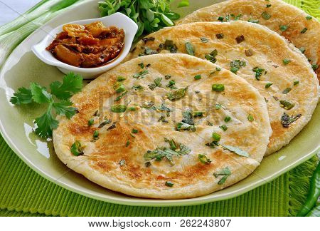 Onion Paratha, Delicious Fried And Layered Bread With Pickle
