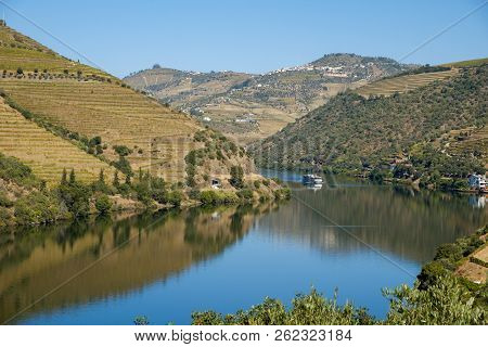 Peso Da Regua, Portugal - October 05, 2018 : Boat Carrying Tourists On The Douro River, Vila Real, P