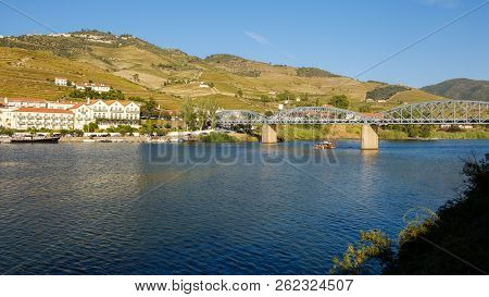 Pinhao, Portugal - October 05, 2018 : Boat Carrying Tourists On The Douro River, Vila Real, Portugal