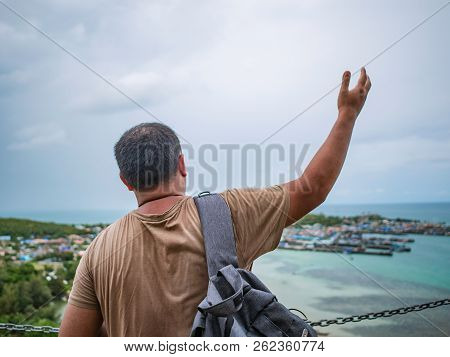 Asisn Fat Backpacker Stand On Top Of  Khao Ma Jor Pier  With Idyllic Ocean Beautiful White Cloud End