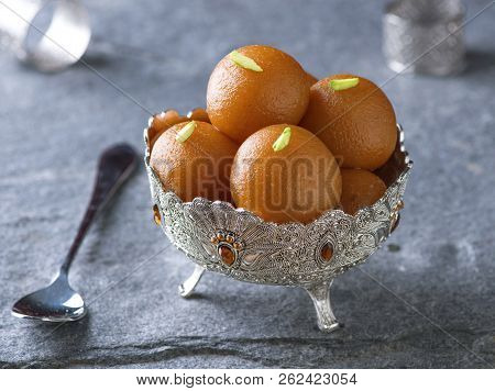 Gulab Jaman, A most famous Indian sweet, cottage cheese balls soaked in sugar syrup.