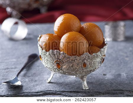 Gulab Jaman, A Most Famous Indian Sweet, Cottage Cheese Balls Soaked In Sugar Syrup.