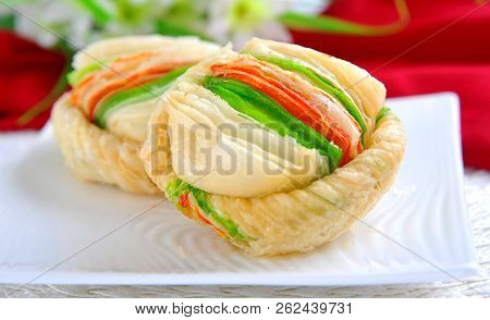 Malai Khaja, Khoya Or Cream Filled Inside, Sweet And Crusty Outside.