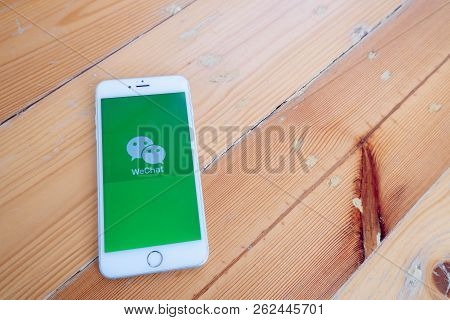 Chiang Mai / Thailand - October 6 2018 :iphone With Wechat Screen On Wood Desk