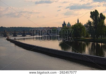 Picturesque View Of The City Prague In Morning. Charles Bridge Over Vltava River And Archer's Island