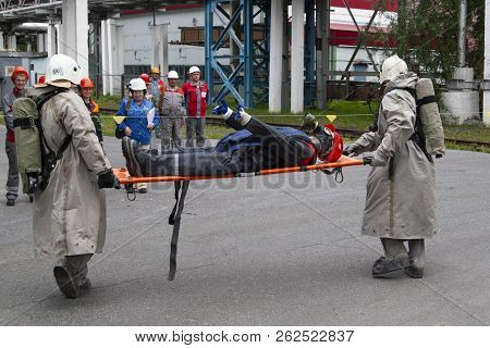 Surgutskaya GRES-2, Surgut, Russia, 24.07.2012. Exercises of rescuers at a chemical plant to save the victim. Rescuers of the fire department 134.