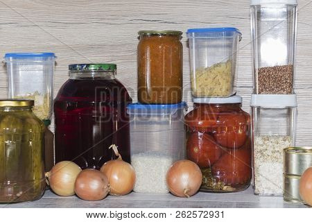 Storage Shelves In Pantry With Homemade Canned Preserved Fruits And Vegetables