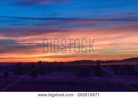 Sunrise Sunset In Golden Autumn In The Luneburg Heath