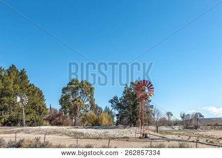 Farm Landscape On Road R356 Between Loxton And Fraserburg In The Northern Cape Province. 9 Water-pum