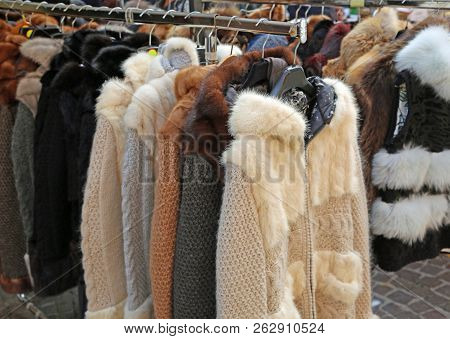 Many Vintage Fur And Clothes For Sale At Flea Market