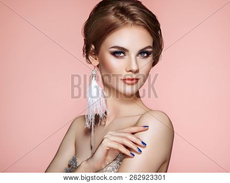 Portrait Beautiful Woman With Jewelry. Model Girl With Blue Manicure On Nails. Elegant Hairstyle. Bl