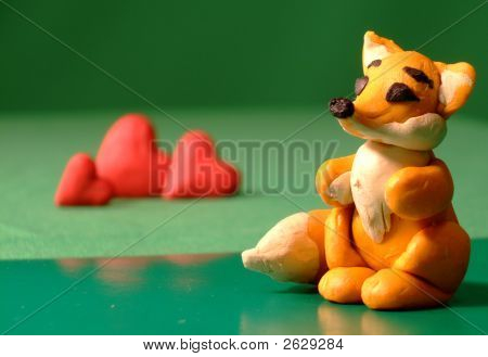 Oyuncak hamuru Fox arkasında 3 kupa ile