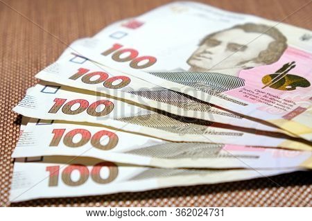 Five Hundred Hrivnas Bank Notes Ukrainian Money On A Fabric Texture Background Closeup.